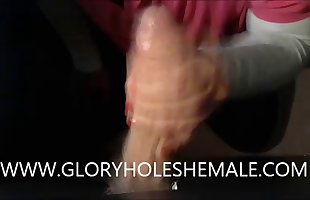 SHEMALE SUCKING HUNG COCK ON GLORYHOLE